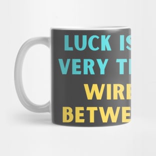 Luck is a very thin wire between Mug